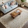 Light Blue Medallion Rug – Scalloped cream border, floral sprays